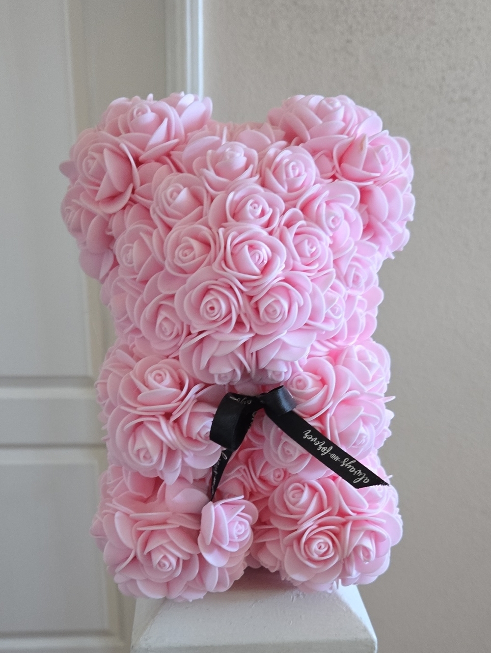 Pink Rose Bear Sculpture with Black Ribbon